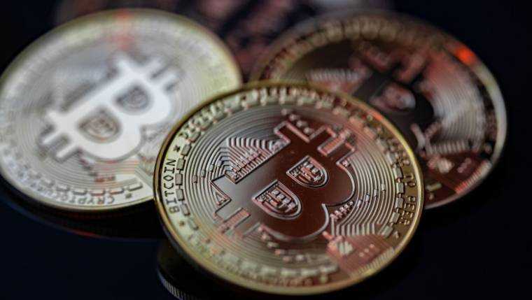 Bitcoin a urcat duminică, pentru prima dată, la peste 80.000 de dolari pe unitate