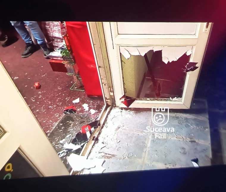 Prins când jefuia un magazin erotic, în noaptea dintre ani. A spart ușa cu toporul